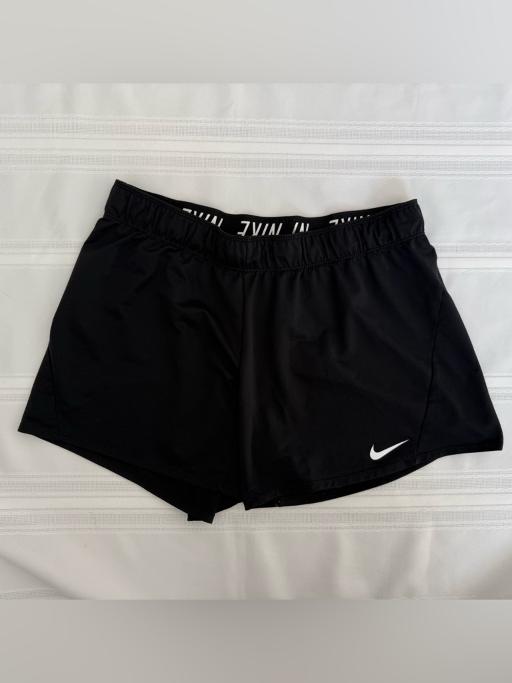 Nike Women's Black Athletic Running Shorts with White Swoosh